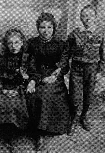 Christina Raynor, nee Collier (centre) with her sister Ellen (left) and brother Lawrence (right). Photo courtesy of the Collier family.